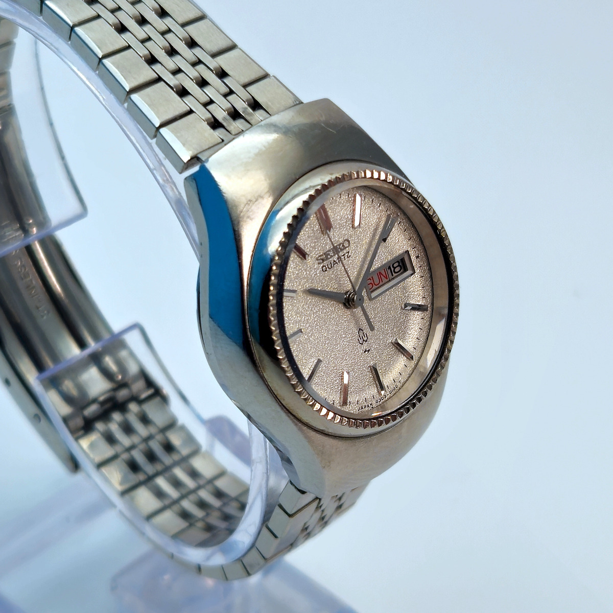 A Seiko 4303-0040 ladies quartz watch from 1976, with diamond dust dial and chamfered bezel. 
