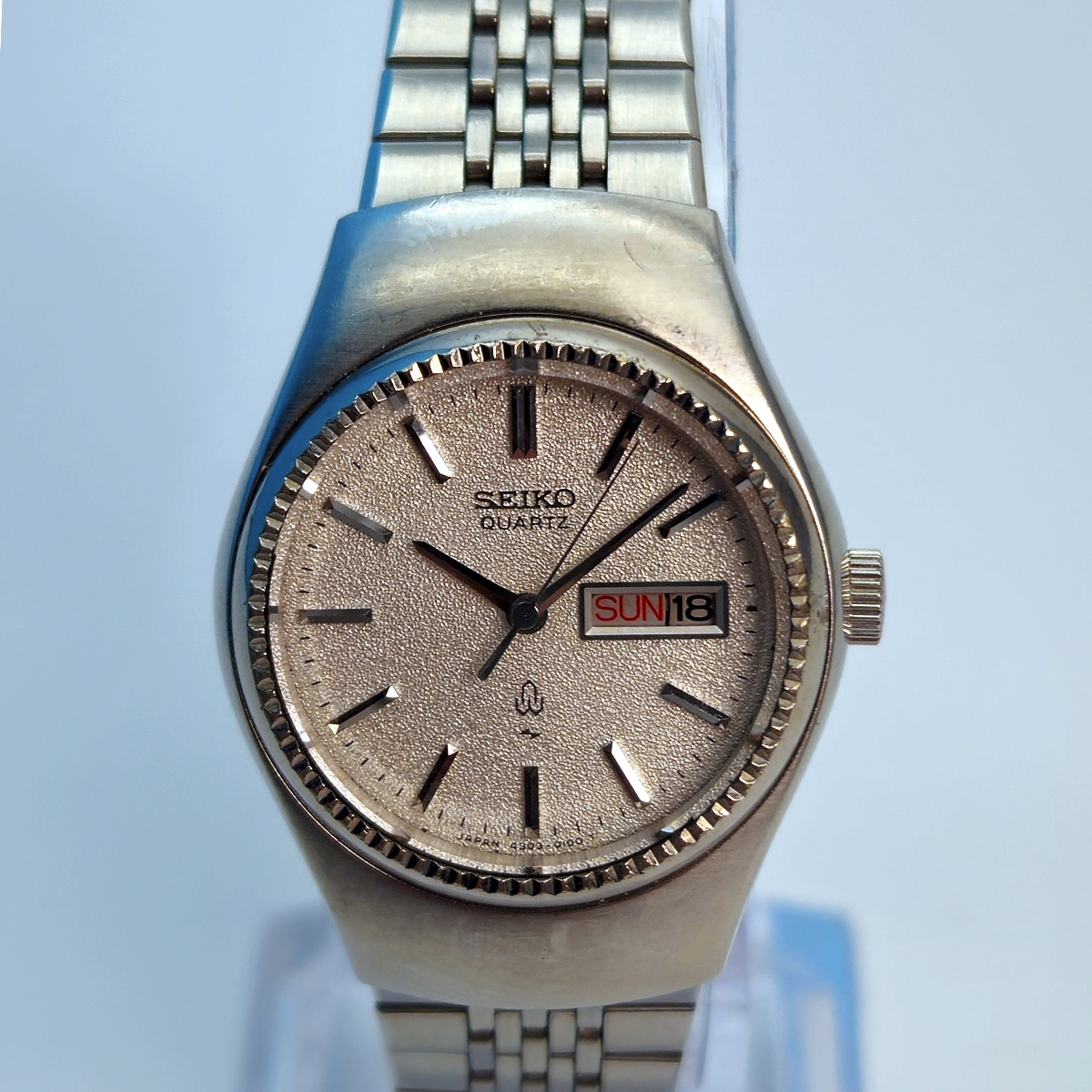A Seiko 4303-0040 ladies quartz watch from 1976, with diamond dust dial and chamfered bezel. 
