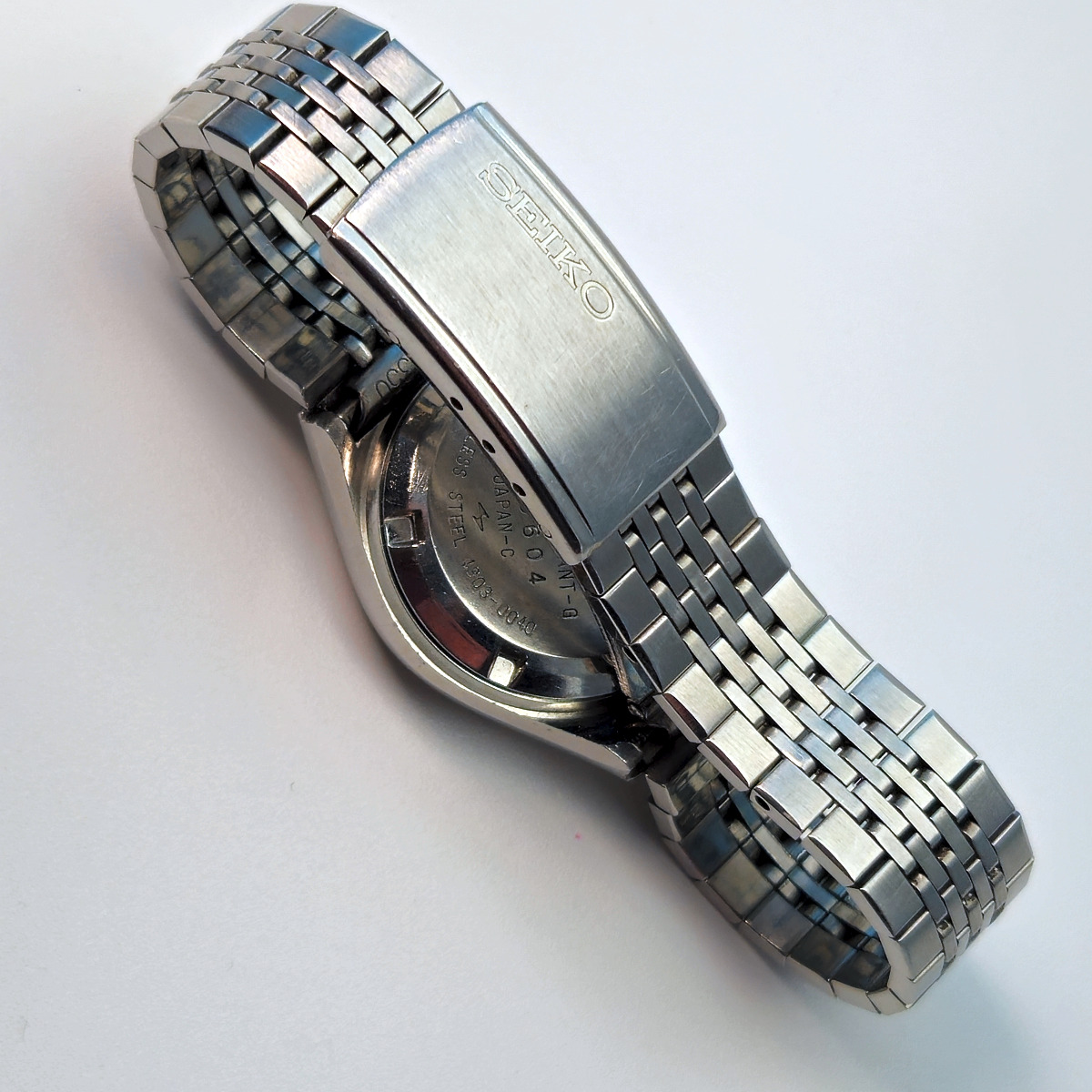 A Seiko 4303-0040 ladies quartz watch from 1976, with diamond dust dial and chamfered bezel. 

