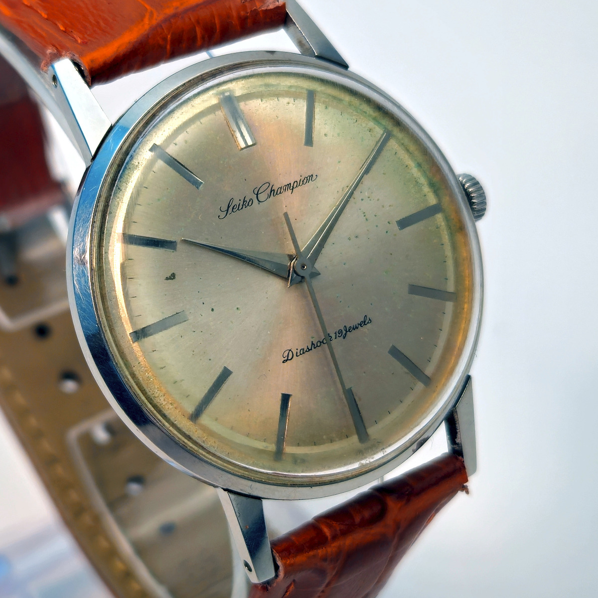 A Seiko Champion gents watch, J15004E, from 1962. 