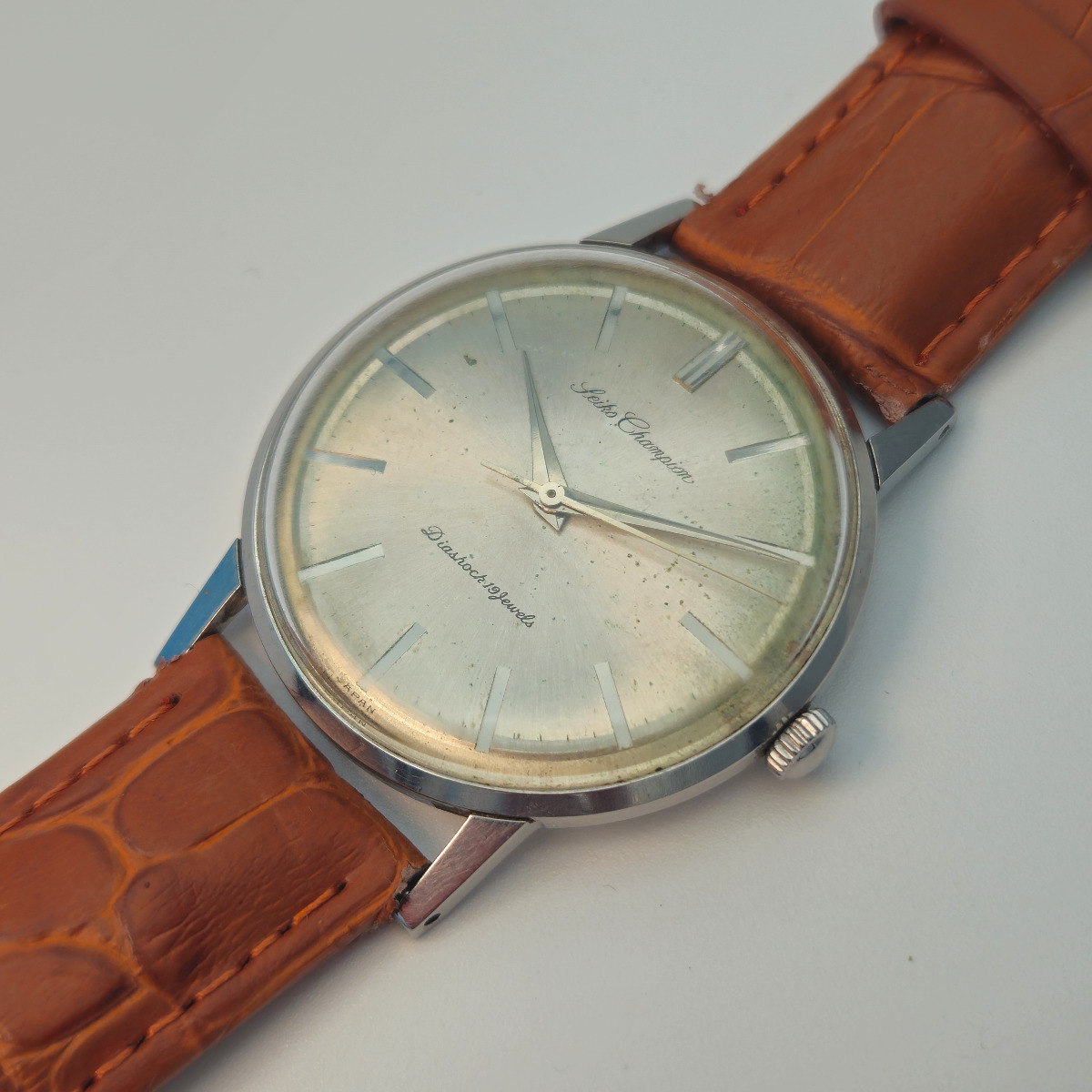 A Seiko Champion gents watch, J15004E, from 1962. 