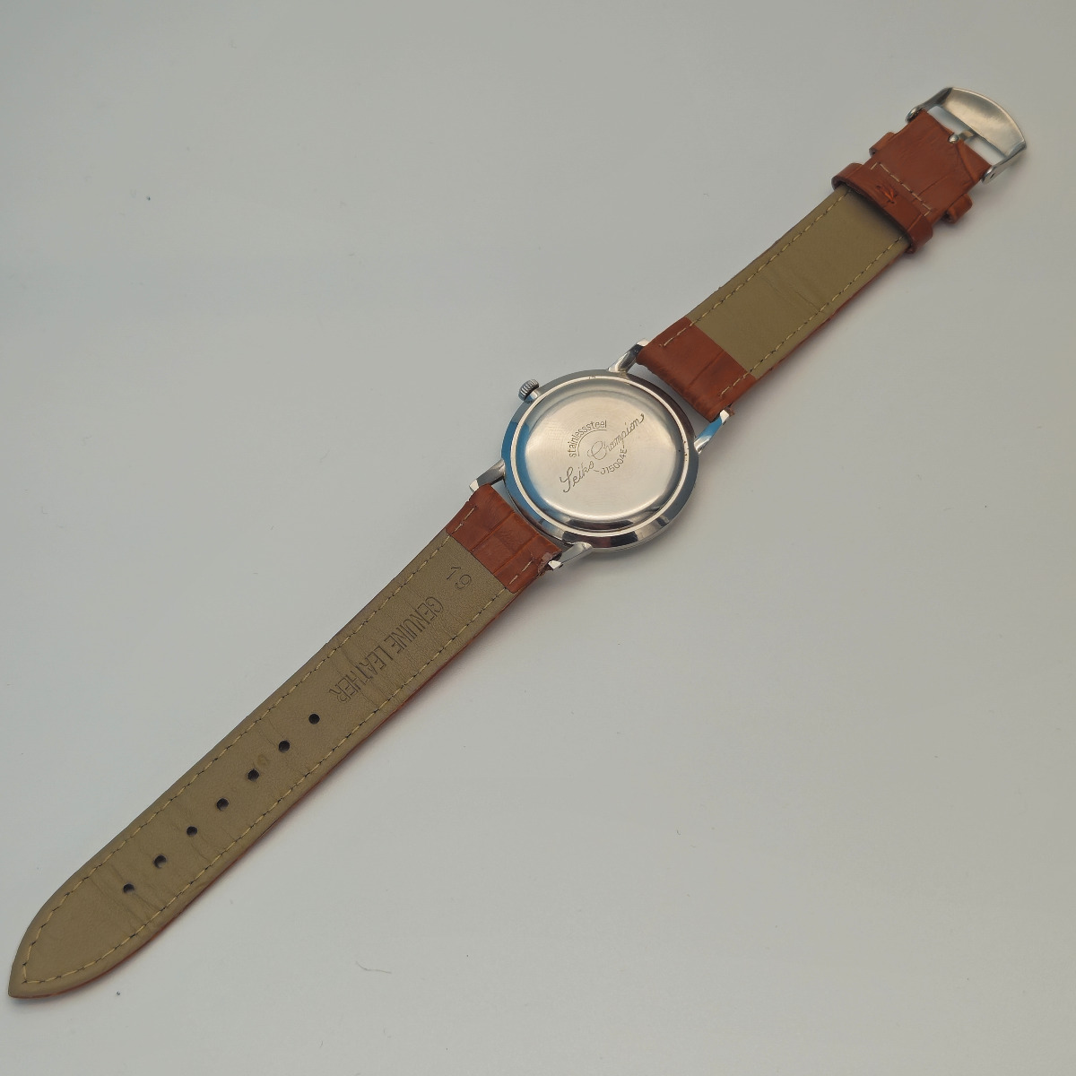 A Seiko Champion gents watch, J15004E, from 1962. 